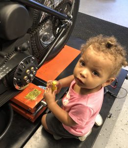 Granddaughter helping get the clutch adjusted.