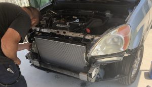 Installing the new radiator in the CRV