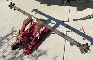 Axle removed from trailer.
