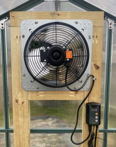 Greenhouse fan and thermostat