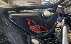 Aerosmith Pinstriping on the Sportster Oil Tank