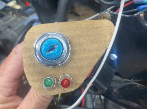 Key switch and indicator light mount mocked up on cardboard