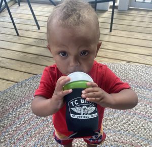 Grandson with his TC Bros Choppers Koozie