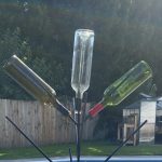 Three Wine Bottles on the Bottle Tree